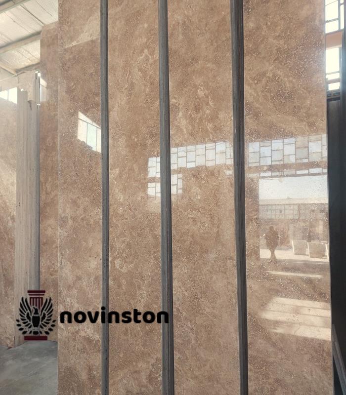 سنگ تراورتن شکلاتی بی موج یزد با کیفیت عالی و قیمت مناسب برای نمای داخلی و خارجی ساختمان.