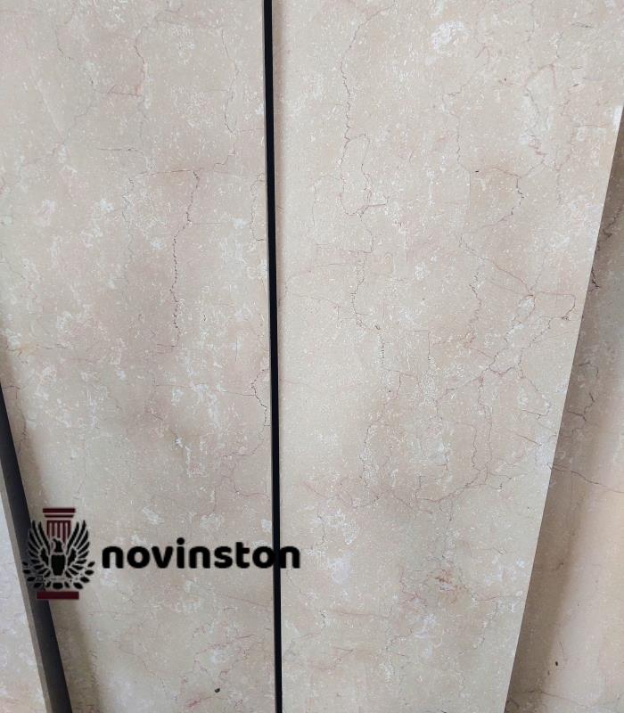  بررسی دقیق فاکتورهای تعیین‌کننده قیمت سنگ مرمریت اداوی از جمله کیفیت، ضخامت، فرآوری و هزینه حمل‌ونقل.