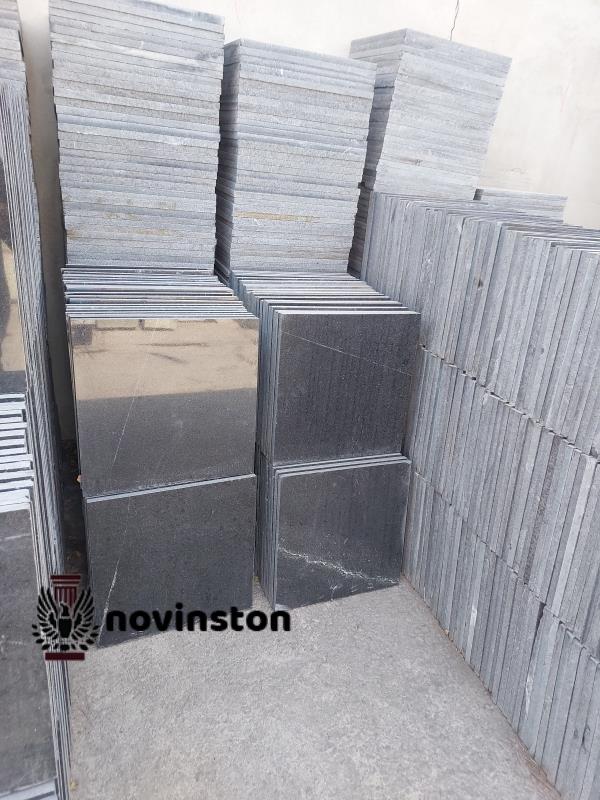 سنگ گرانیت مشکی نطنز 40x40; مقاوم، زیبا و مناسب برای کف و دیوار. خرید با بهترین قیمت در نوین سنگ.