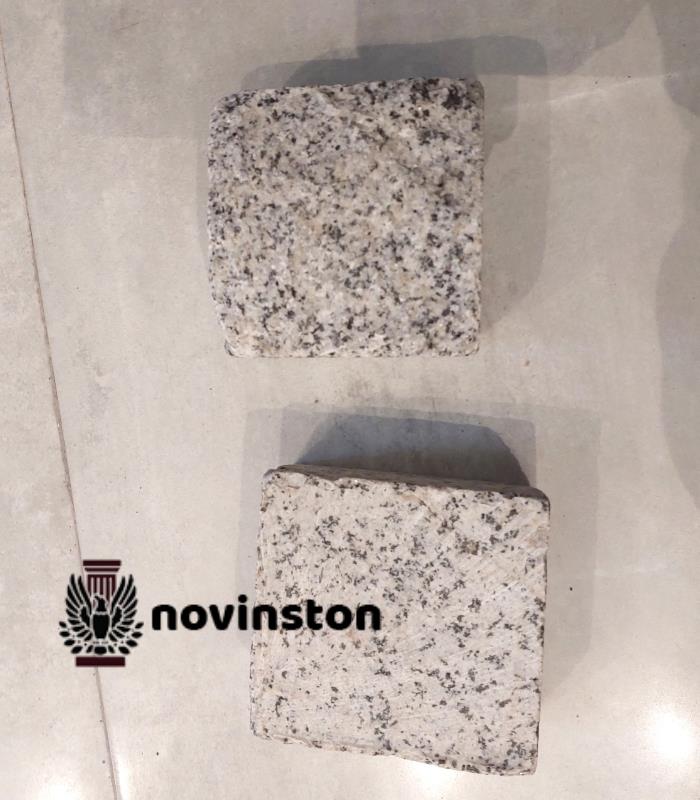 سنگ کوبیک گرانیت سفید نطنز در ابعاد 10x10 و ضخامت‌های مختلف؛ انتخابی مقاوم و زیبا برای محوطه‌سازی و کف‌سازی.